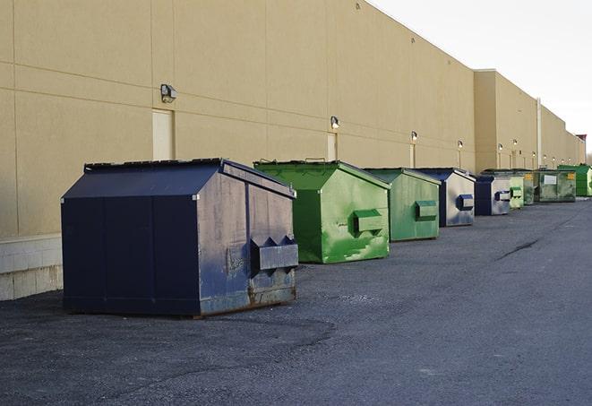 brightly colored dumpsters filled with construction waste in Daleville VA